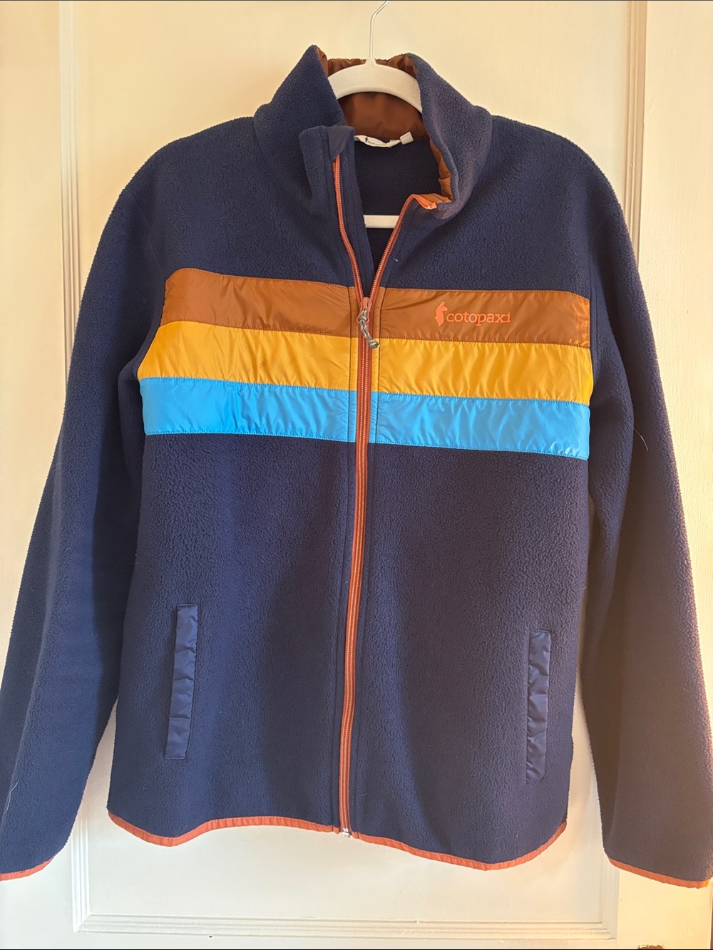 cotopaxi Navy Fleece Jacket with Yellow & Blue Stripe Panels